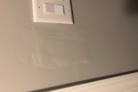drywall-baseboard-water-damage.png Water damage affecting drywall near a baseboard.