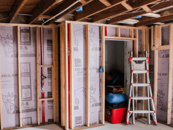 new-home-drywall-installation.png Newly installed drywall framing ready for finishing in a residential home.