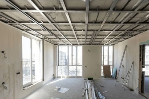 commercial-metal-stud-framing.png Interior commercial metal stud framing prepared for drywall installation.