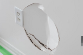 drywall-electrical-cutout.png Clean drywall cutout prepared for an electrical outlet installation.