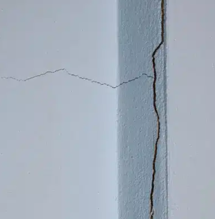 inside-corner-drywall-crack.png Drywall crack along an inside wall corner caused by settling.